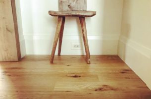 Wooden chair on reclaimed white oak floor