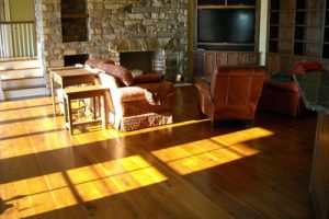 Wide plank flooring in den