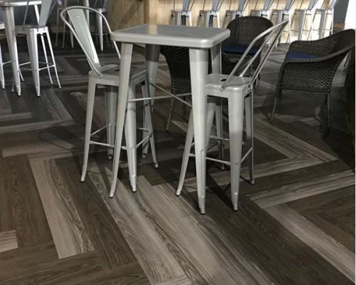 Herringbone wood floor in restaurant